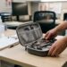 Healthcare worker placing a stethoscope into a protective case